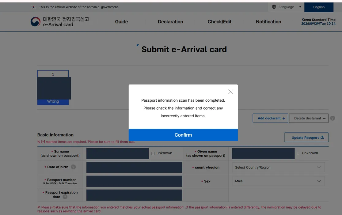 The screen after the passport scan completes, asking you to check and correct the recognised fields, with country/region still unselected