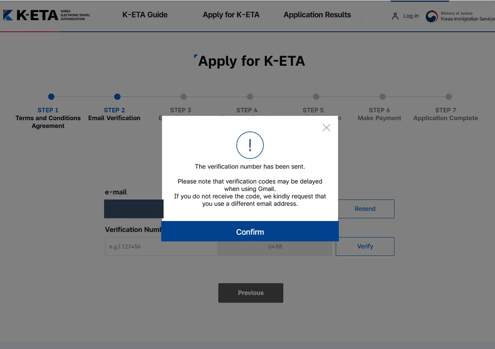 The popup shown immediately after sending the verification code, warning that codes may be delayed when using Gmail and asking the applicant to use a different address